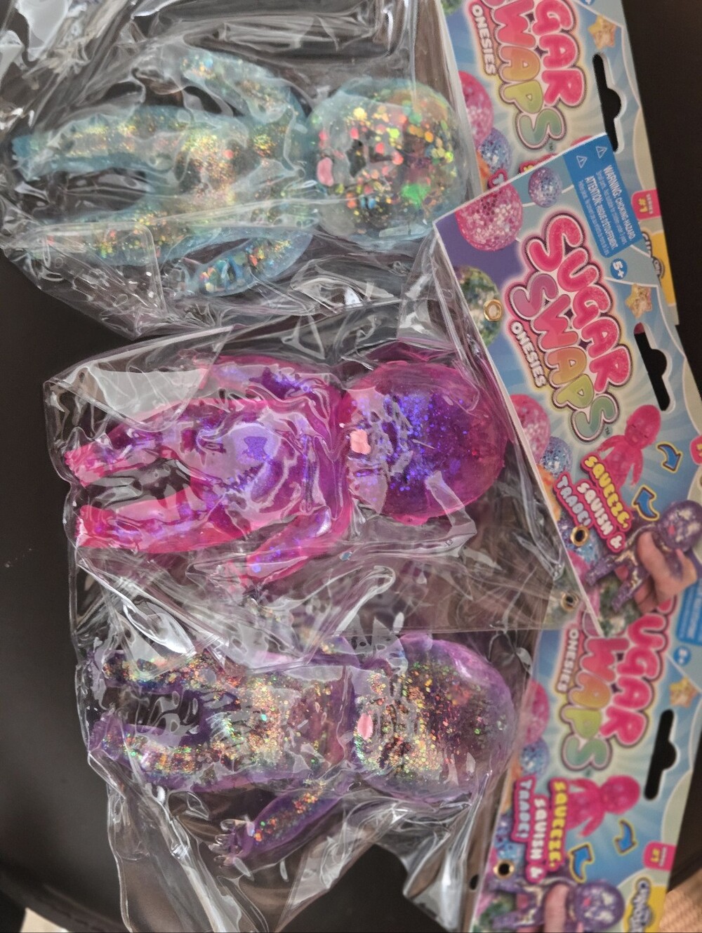 Sugar Swaps Glitter Purple Squeeze Doll - Assorted Colors 6 Inch